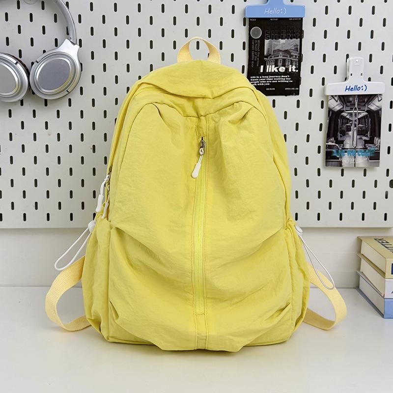Schoolbag leisure travel backpack simple small fresh student schoolbag niche light solid color backpack spine protection burden reduction