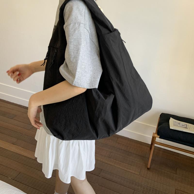 Autumn and winter versatile commuter shoulder bag women's large-capacity lazy style casual canvas tote bag new armpit bag