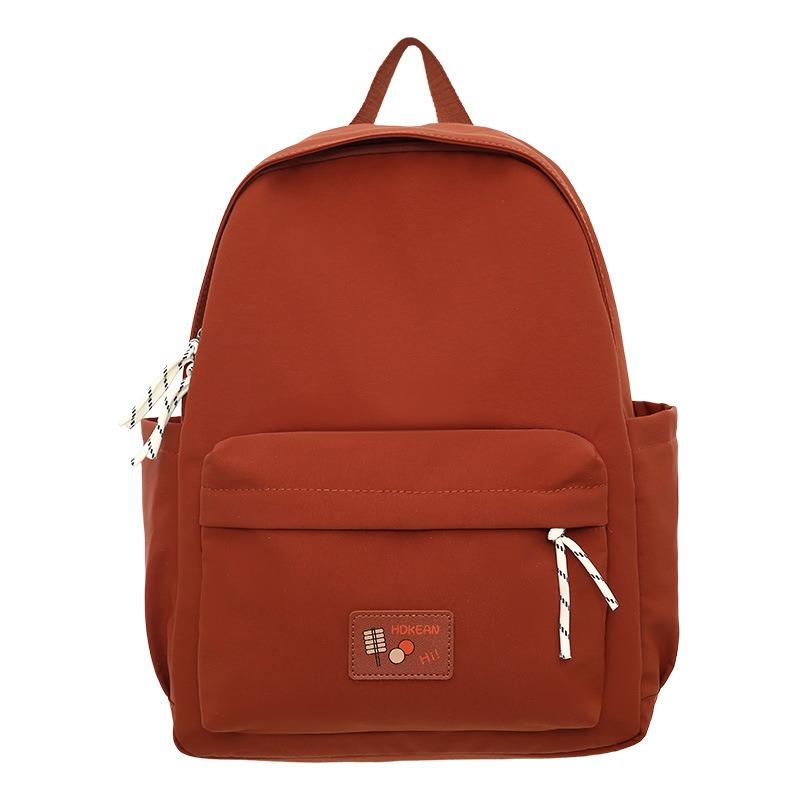 New casual simple solid color backpack large capacity junior high school student schoolbag