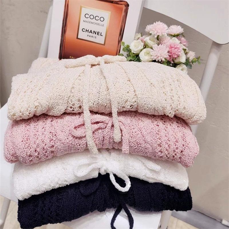 Thin cardigan new women's clothing in stock, European and American hollow lace-up sexy top long sleeve