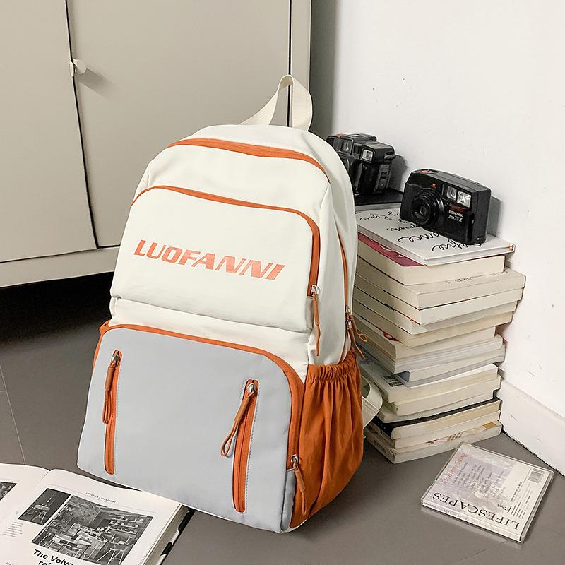 2025 new men's and women's backpacks, large-capacity multi-functional fashion backpacks, waterproof schoolbags for junior high school students, women