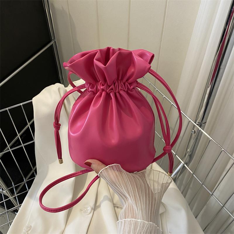 Fashionable Simple Bucket Bag For Women With Soft Structure Available In Black White Brown And Fuchsia