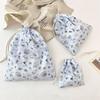 Embossed Cartoon Drawstring Bag - Dustproof Portable Cloth Organizer for Cosmetics