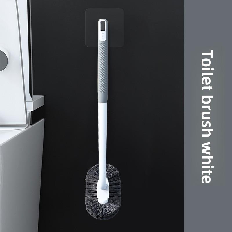 Wandmontierte Toilettenbürste - Eine wandhängende Toilettenbürste ohne Lücken, geeignet zum Aufhängen an der Wand eines Badezimmers zur Verwendung mit einer Toilette.