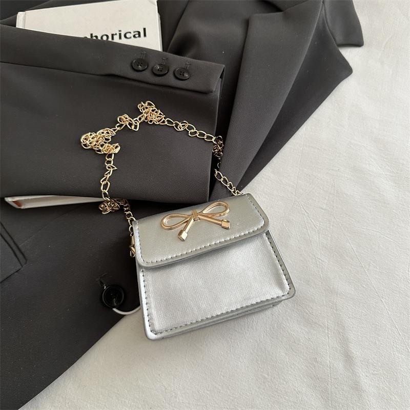 

Simple bow saddle bag women s new spring and summer temperament shoulder bag personalized fashion shoulder messenger bag серебряный