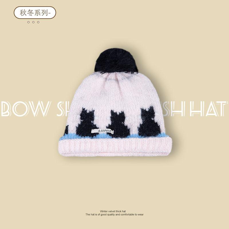 

New autumn and winter kitten hairball thickened warm knitted hat women s contrasting wool hat one size fits all рожевий