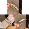 Geometrisches Goldplattiertes Zirkonium Ovales Manschettenarmband Für Modebewusste Frauen