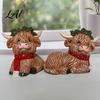 Decorative Resin Sculpture 2Pcs Christmas Highland Cow Figurine Yak Statue with Red Holiday Gift for Her Scarf Cute Animal Desktop Ornaments
