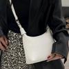 Leather lunch box bag, high-end niche casual messenger bag 2025 new hand-carried crescent bag, fashionable and simple portable