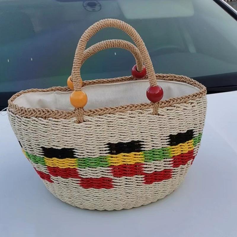 2023 Handmade Woven Straw Bucket Bag: Cute Picnic Basket with Tassel and Wood Bead Decoration