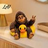 Small Collectible Ornament Sasquatch And Duck Figurine on Swimming Ring Statue Resin Funny Animal Statue for Home Tabletop Shelf Decor Whimsical