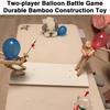 Balónek Bamboo Man Battle Toy Ručně vyráběné dřevěné šermířské loutky Rychlá interaktivní hračka pro 2 hráče Bitevní hra s balónky