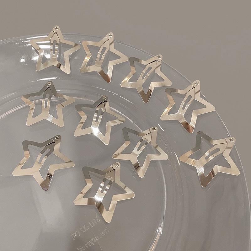Y2K Star Hair Clips: Cute Five-Pointed Star Accessories for Kids' Side Bangs.