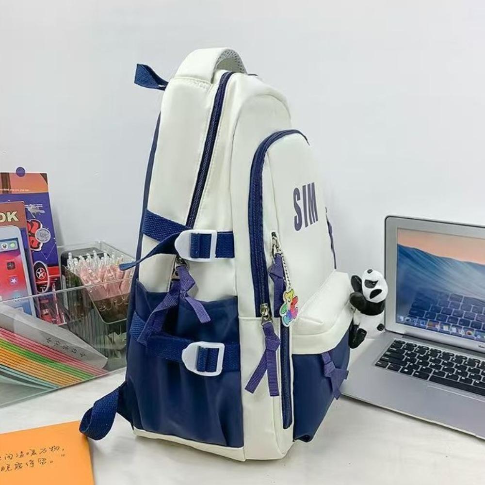 Large capacity ins wind backpack female junior high school high school student lightweight schoolbag computer backpack male trendy model