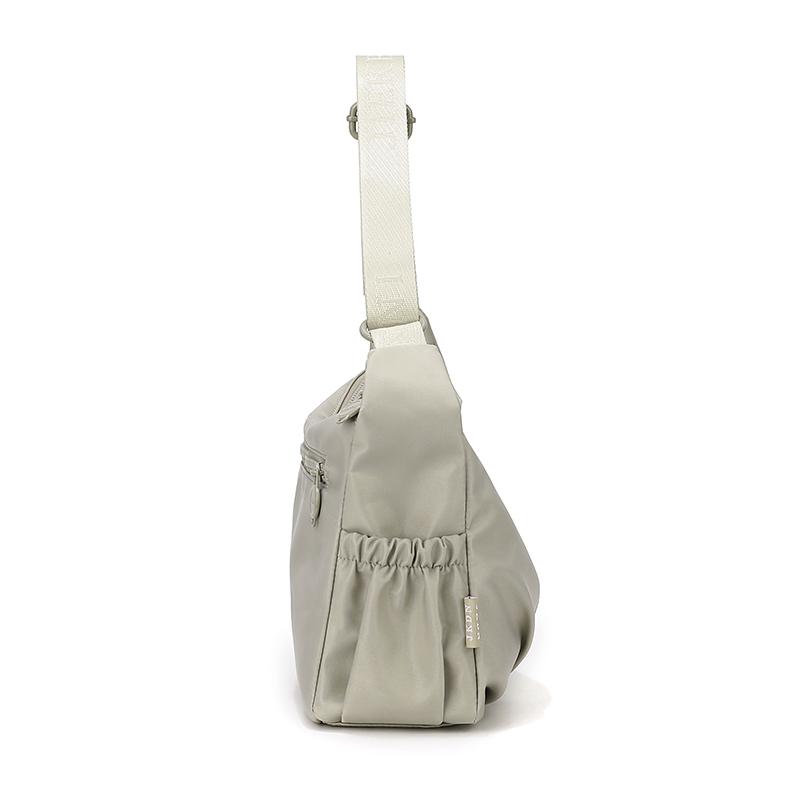 Elegant Slouch Shoulder Bag with Top Zip Closure Adjustable Strap Geometric Stitching and Smooth Nylon Fabric for Modern Daily Wear and Commuting