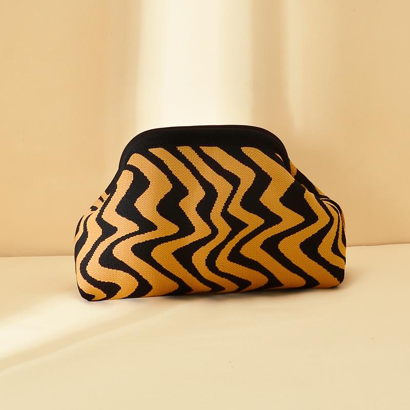 Knitted bag, striped clutch bag, women's flying woven clouds, versatile temperament, portable cosmetic bag, large capacity