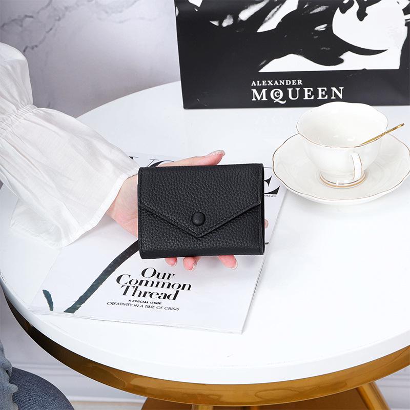 Damkompakt plånbok i söt japansk stil av mjukt kohudläder, enkel vikbar kuvertmyntbörs