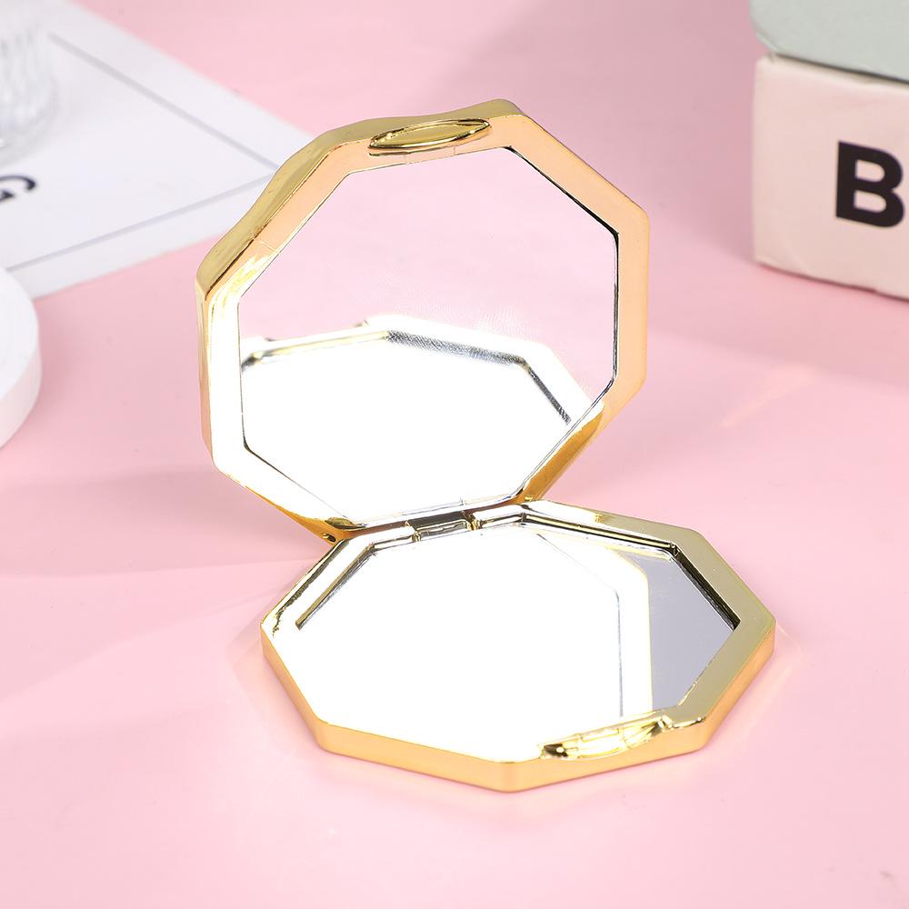 Portable Double-Sided Folding Mirror - Compact, Durable Handheld for Home or Travel.