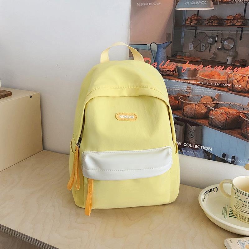 High value, fresh and sweet contrasting color backpack, light and multi-pocket backpack for primary and secondary school students