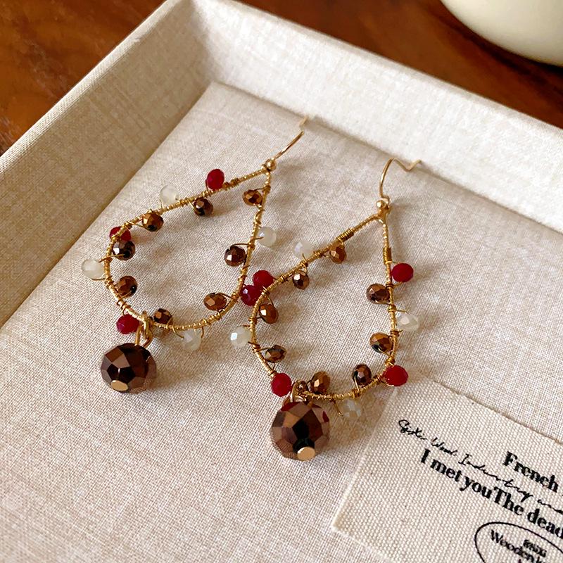 High-End Ethnic Teardrop Tassel Earrings with Cutout Design – Luxury Trend Jewelry
