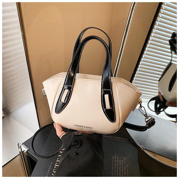 

Нишевая сумка женская новая модная высококлассная универсальная сумка-мессенджер в форме ведра для通勤, маленькая сумка белый