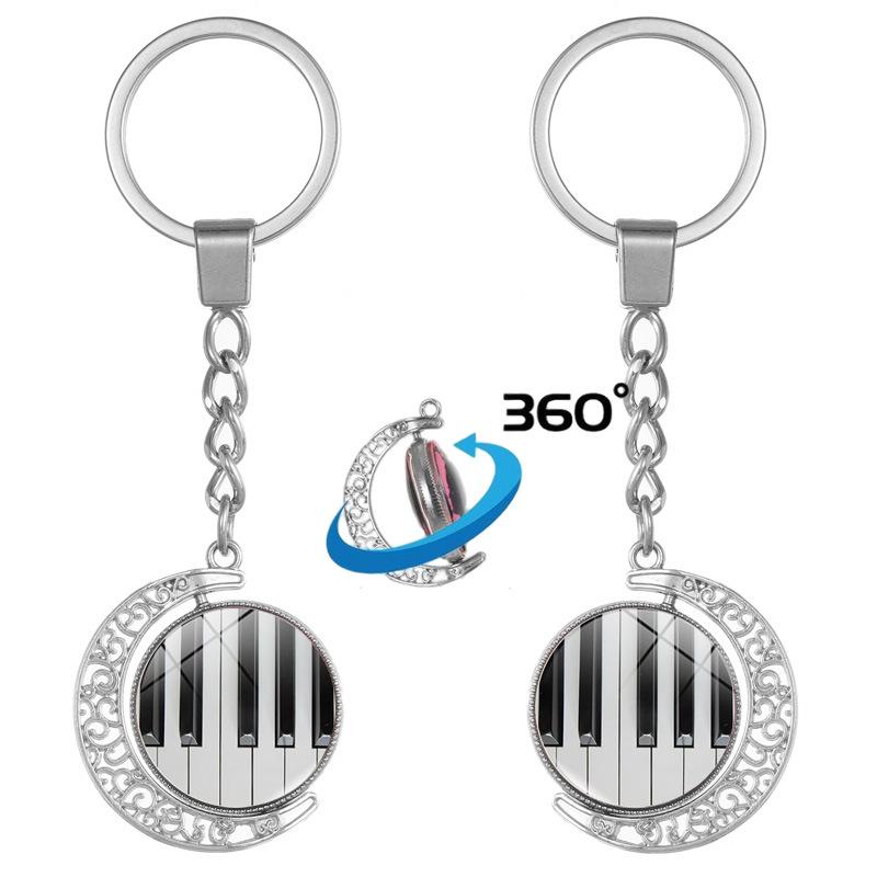 Heart-Shaped Rotating Piano Key Pendant Keychain with Gem and Musical Notes Ornament