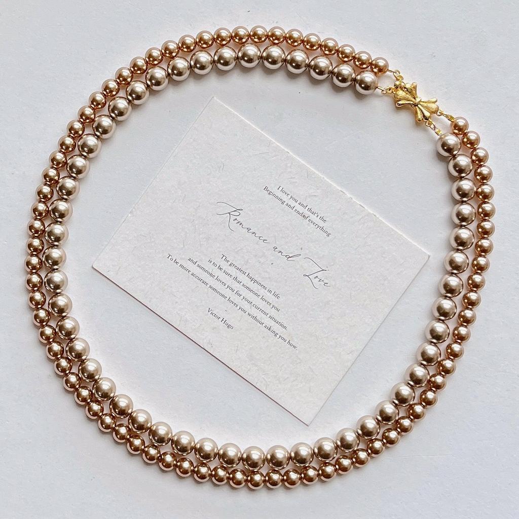 Maillard Wind Gold Camocha Color Shijia Pearl Double Layer Design Sweater Chain Necklace Clavicle Chain