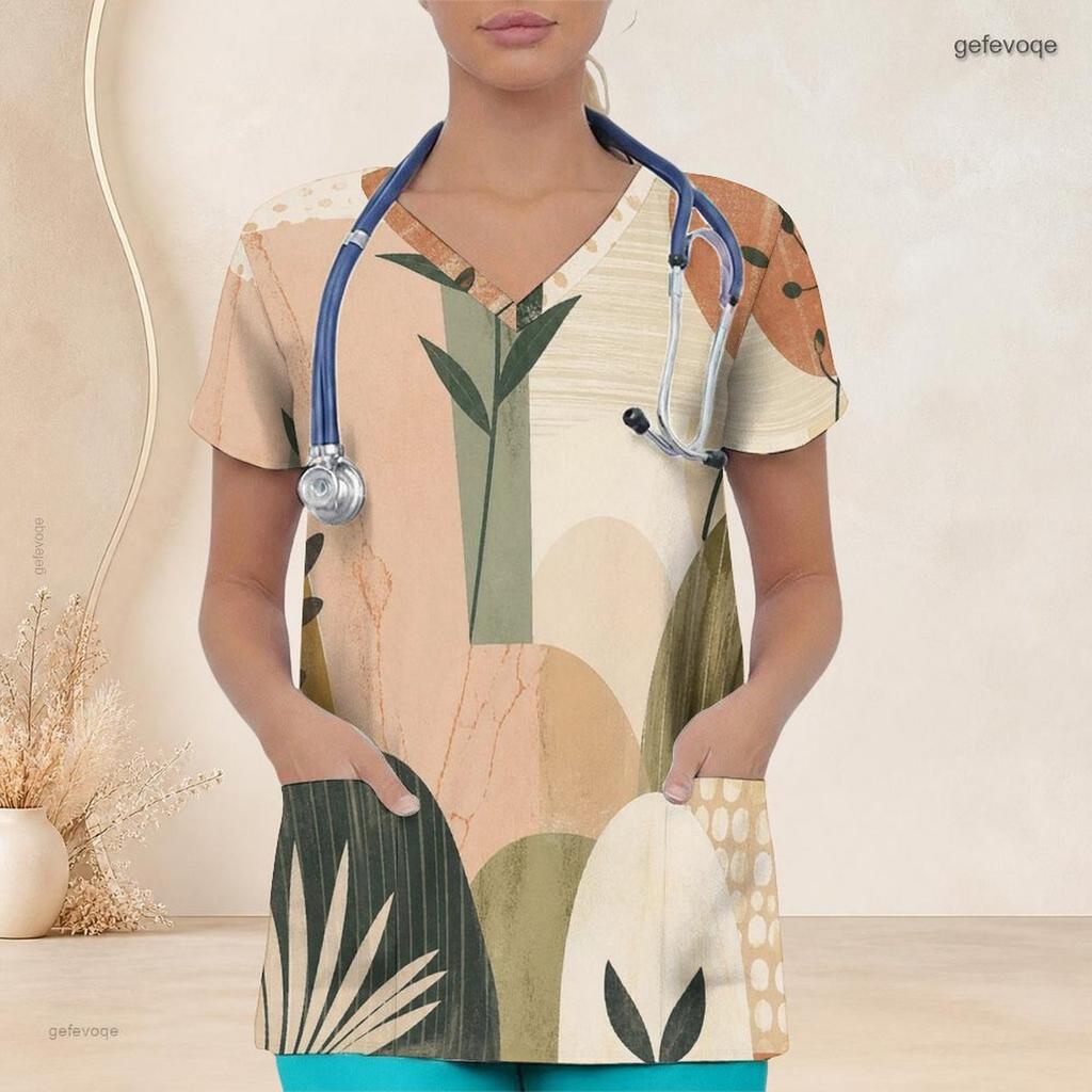 Top de uniforme de enfermera para mujer de talla grande con estampado abstracto de hojas, cuello en V, manga corta, bolsillos frontales
