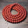 Handcrafted Dragon Scale Bodhi Seed Bracelet with Red Burst Finish