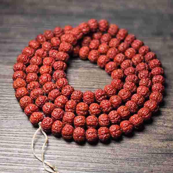 Handcrafted Dragon Scale Bodhi Seed Bracelet with Red Burst Finish