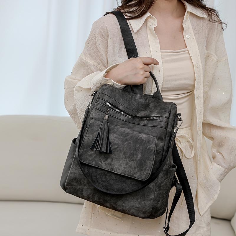 Women's Soft Leather Backpack Large Capacity Student Commuter Schoolbag Tassel Travel Backpack