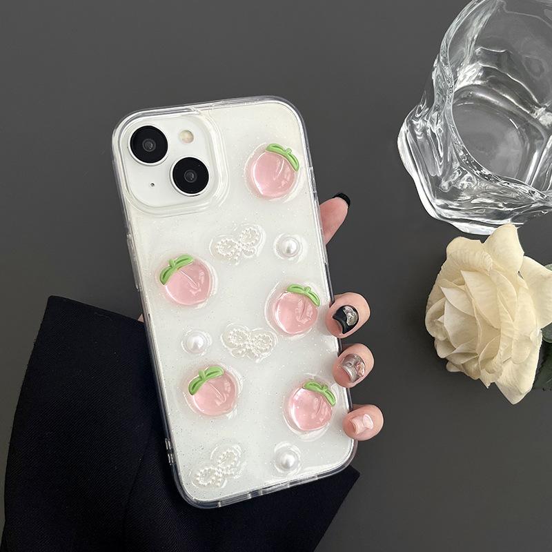 

Cherry and peach mobile phone case is suitable for Apple 17Promax glitter pearl Iphone16 bow tie transparent women s model. iPhone 7/8/SE 2020