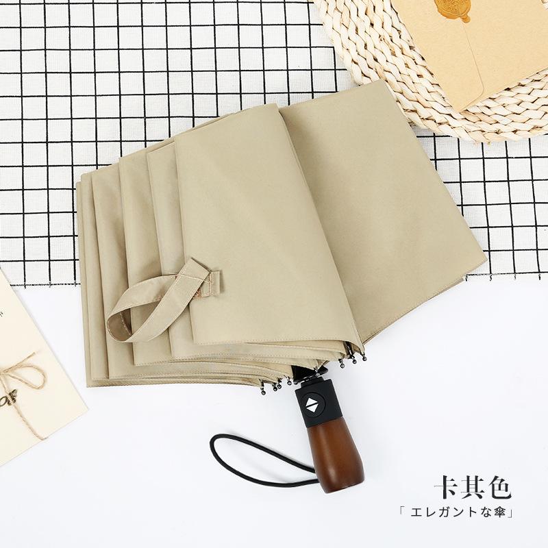 Three-fold ten-bone automatic folding umbrella solid wood handle lettering umbrella gift