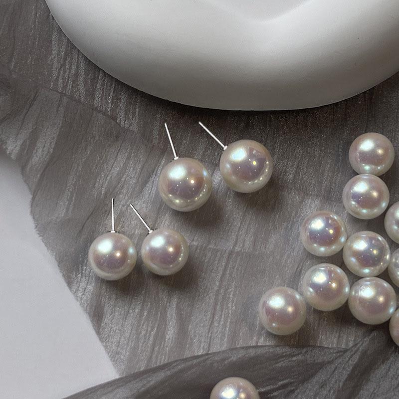 French Retro Pearl Earrings: Trendy 2025 Style with Korean 925 Silver Needle - Elegant Commuting Statement.