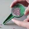 Adjustable Handheld Seed Planter Tool with Five Settings Manual Garden Seeder for Home Use Easy Seed Dispensing and Precise Planting