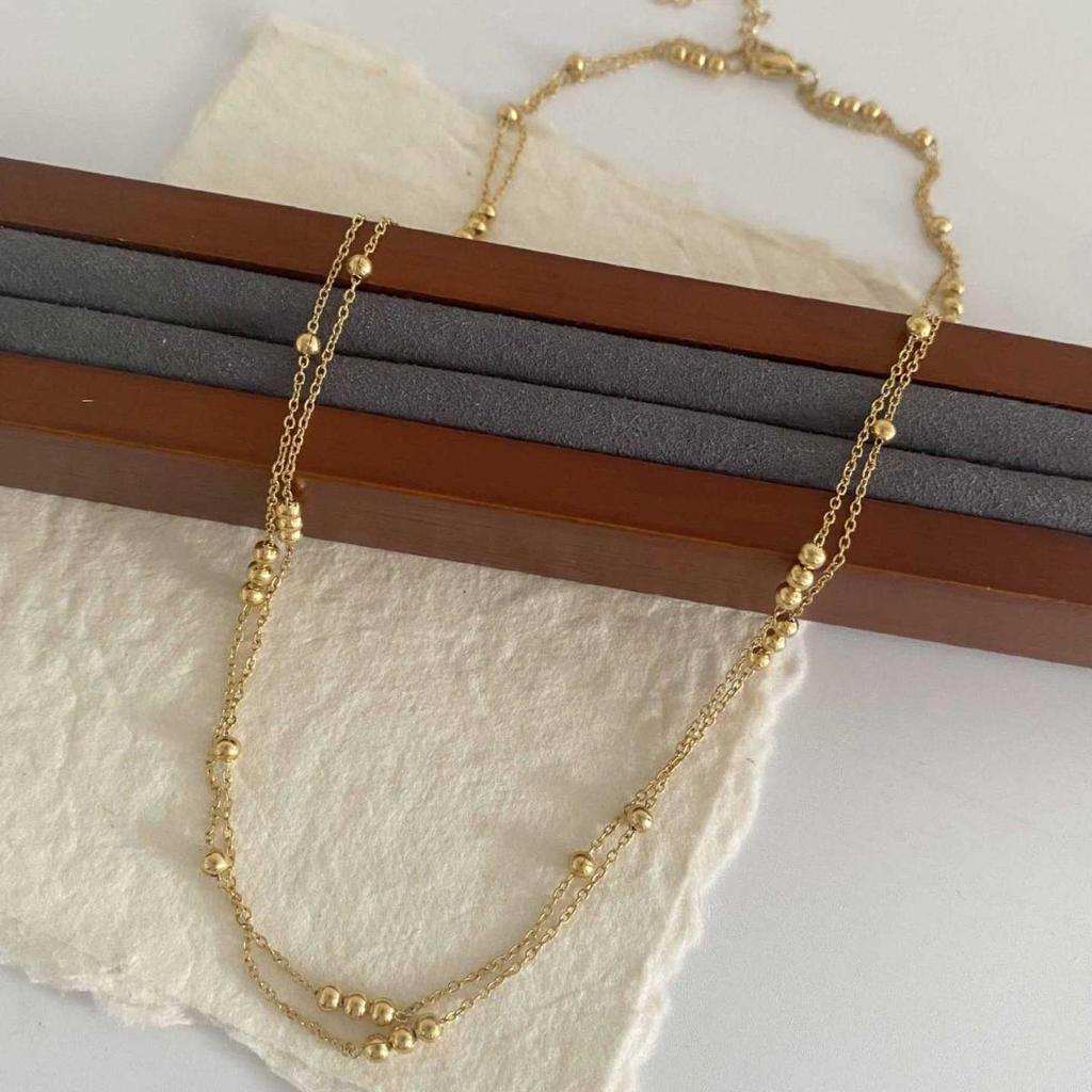 Chic Gold Double-Layer Round Bead Necklace: French Style, High-End Luxury Clavicle Chain for Women