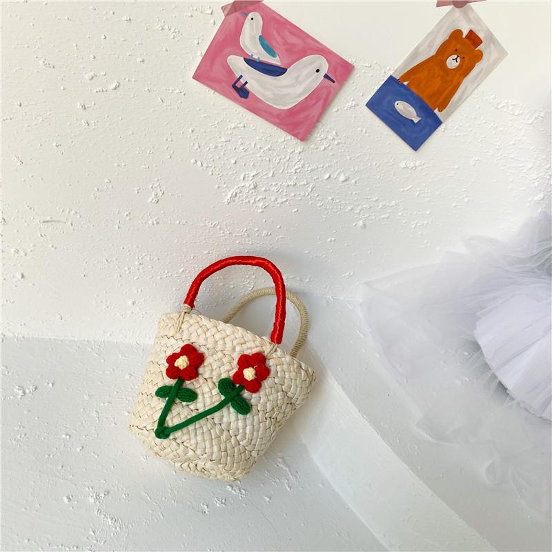 

Cute Woven Kids Handbag Summer Beach Bag For Girls Featuring Adorable Floral Design