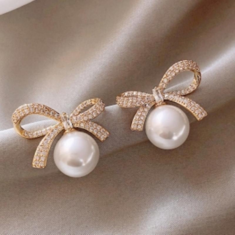 

Серьги-пусеты с циркониевыми бантиками, милый темперамент, модные и универсальные серьги, серьги класса люкс и высокого качества.