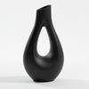 Vaso decorativo a forma di goccia in nero, design minimalista per fiori