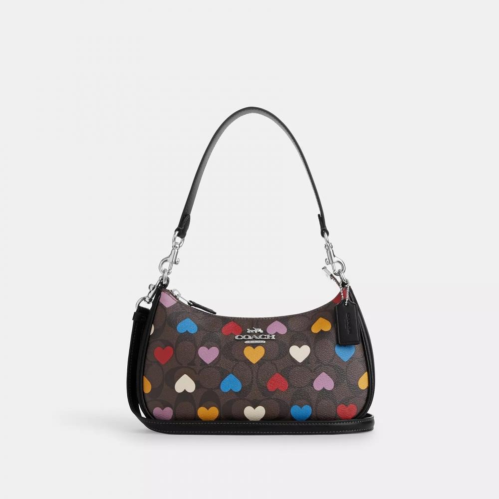 

Сумка через плечо Coach Teri из фирменной парусины с принтом в виде сердечек