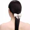 European & American Pearl Bow Hair Clip: Korean Fashion Rhinestone Butterfly Hair Accessory for Girls.