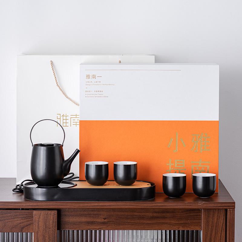 

Легкий роскошный теплый чайный поднос, чайный набор Кунг-фу, подарочный набор высокого класса, чайник с ручкой, один чайник и четыре чашки, памятные деловые подарки