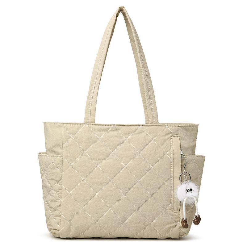 Tragetasche, Eine lässige und leichte Ein-Schulter-Handtasche mit großem Fassungsvermögen in Diamantform