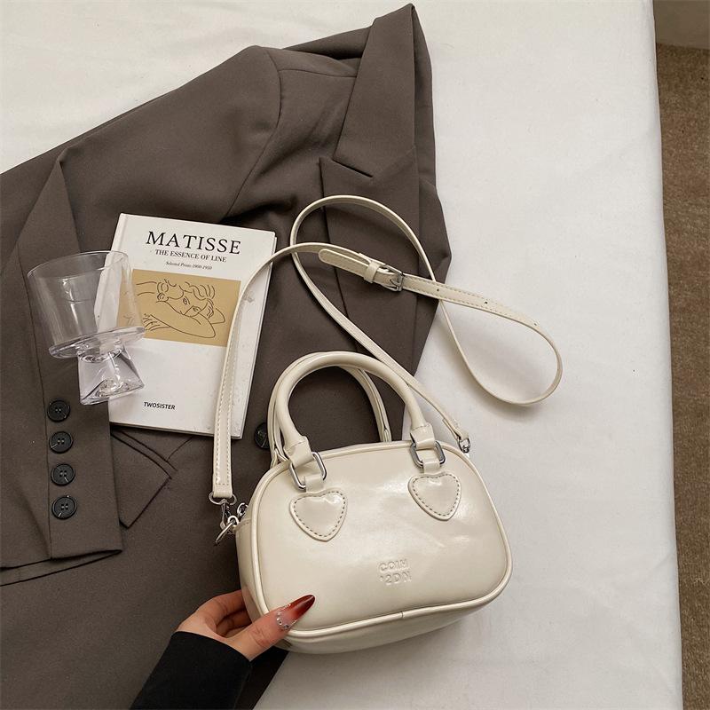 Summer popular small bag women's new fashion versatile messenger bag high-end portable bowling bag