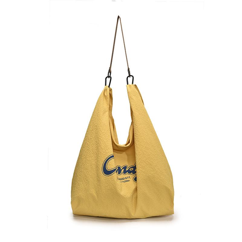 

Women s large-capacity single shoulder niche design casual portable oblique span bag trendy fashion women s tote bag жёлтый