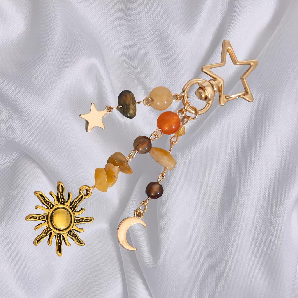 Porta-chaves Geométrico de Estrela e Lua, Apresentando um Estilo Pastoral Simples com um Design de Pedra Irregular, Perfeito para Pendurar numa Mochila.