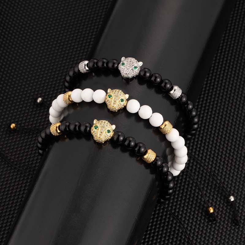 Men's Punk Braided Titanium Steel Bracelet with Leopard Head, Zircon, and Pineapple Beads.