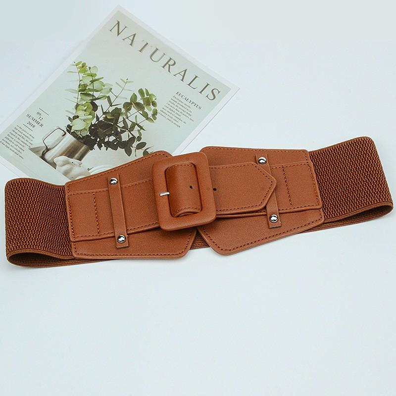 Elastic and Tight, Waist-cinching and Slimming. A Lady with A Waist Belt Paired with A Down Jacket and Sweater. A Retro Wide Waist Belt for Women