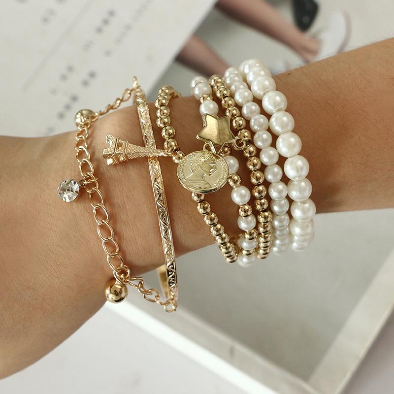Korean version of multi-element Eiffel Tower pearl retro bracelet, coin six-piece jewelry multi-layer elastic bracelet