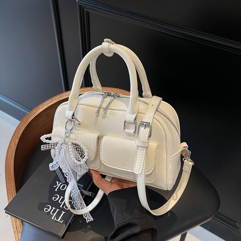 

Casual underarm bowling bag women s 2025 new Korean version simple and versatile bow shoulder crossbody pillow bag without pendant